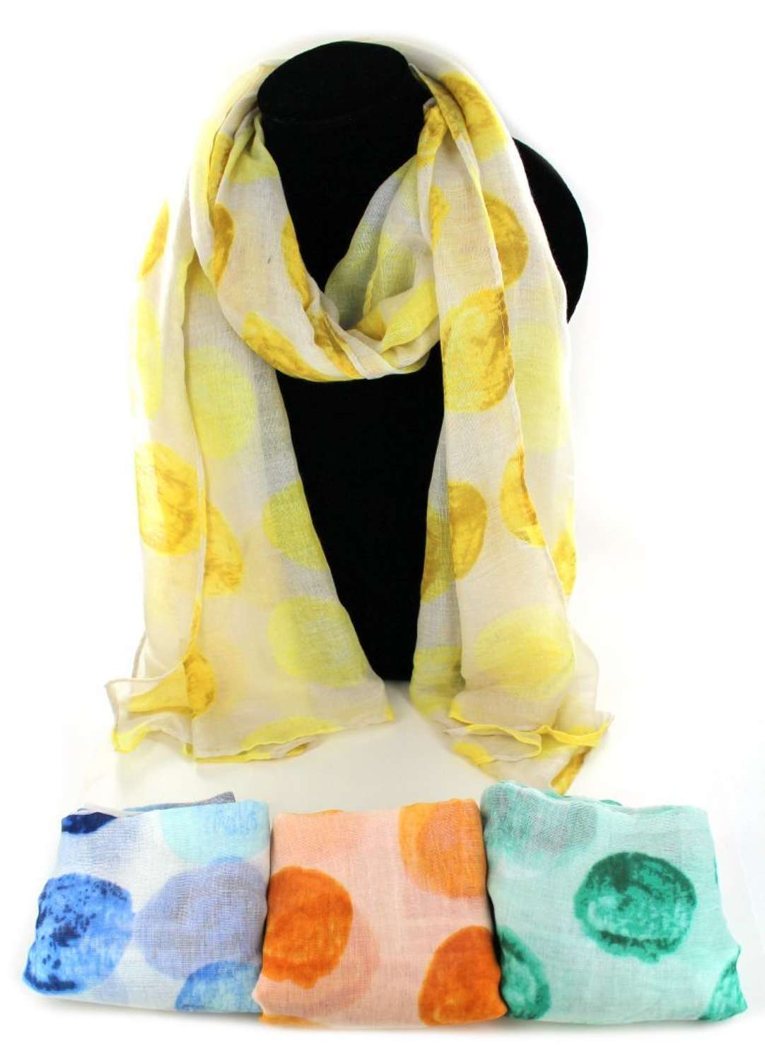 Brightly coloured polka dot print scarf.